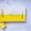 "HushPods by Aerplugs – close-up of yellow and white foam earplugs with high noise reduction for peaceful focus and sleep"